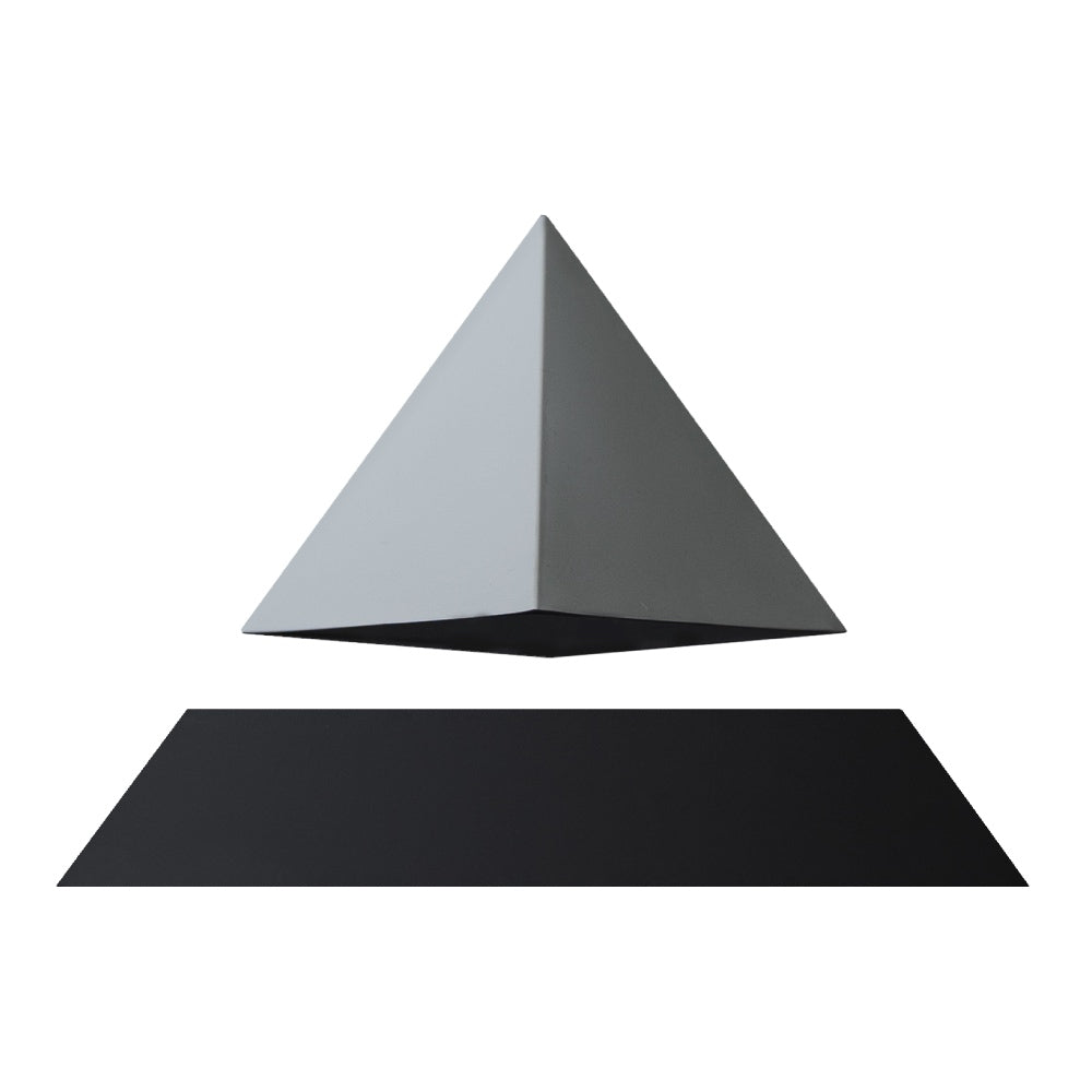 Levitating pyramid Py by Flyte, grey top on a black base, product photo on a white background