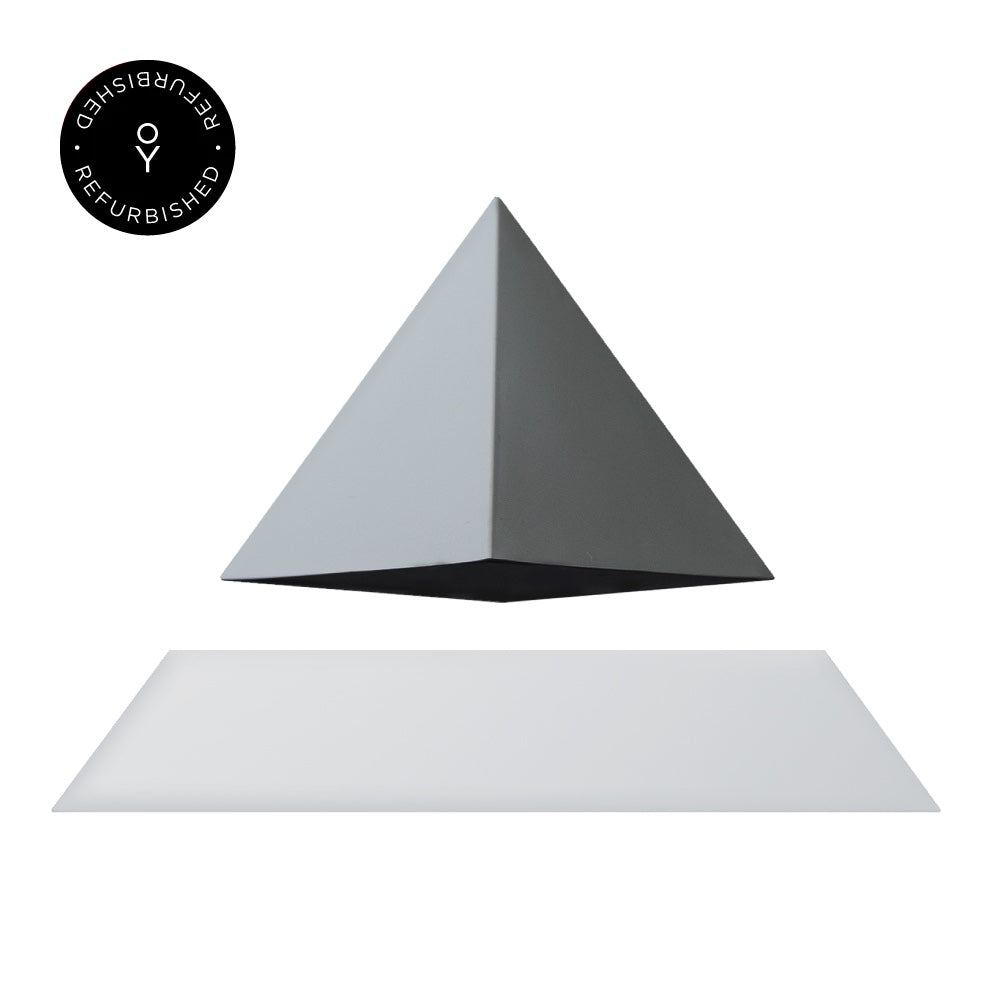 Levitating pyramid Py by Flyte, grey top and white magnetic base version, product photo on a white background with refurbished tag