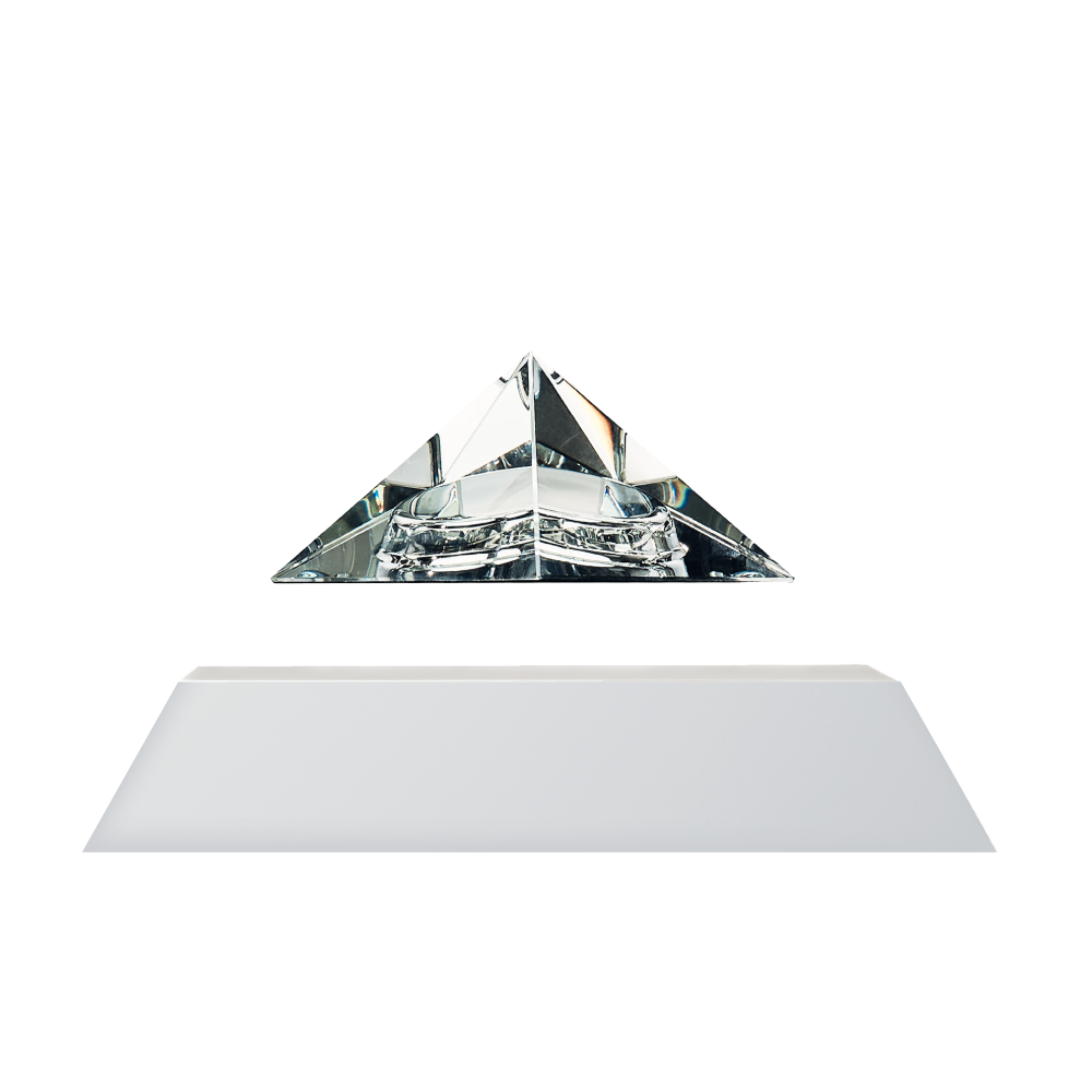 Levitating pyramid Py by Flyte, clear crystal top, white base option, product photo on a white background