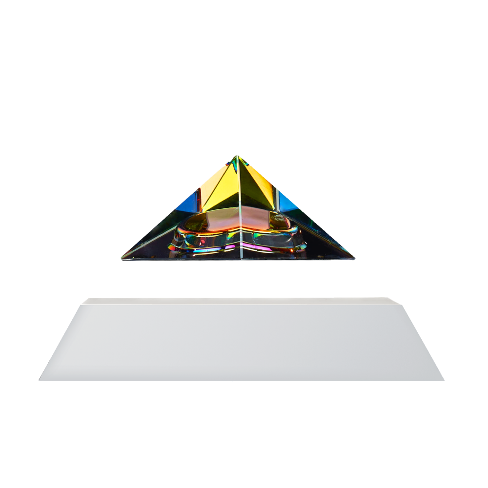 Levitating pyramid Py by Flyte, iridesctent crystal glass top with white base, product photo on a white background