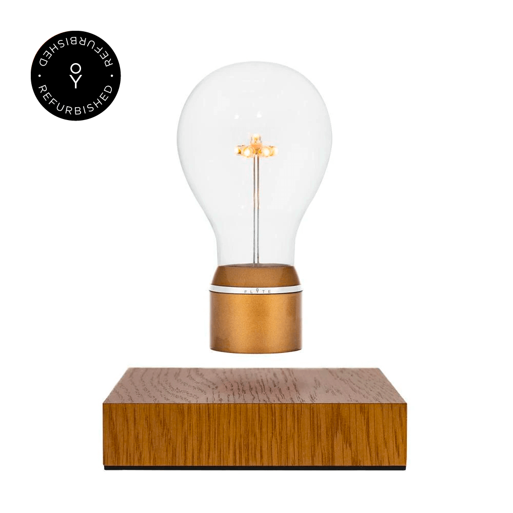 Levitating light bulb Light Edison by Flyte, product photo of gold cap bulb and oak magnetic base version with refurbished tag