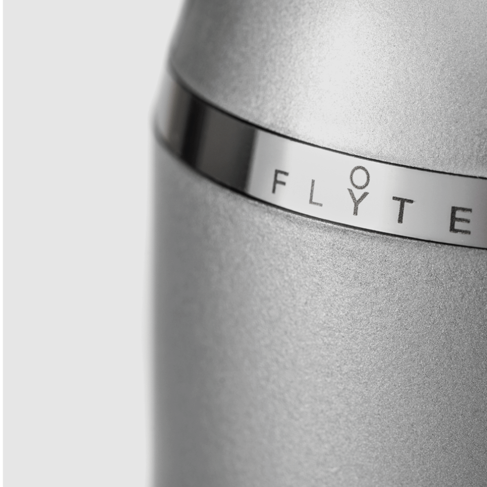 Close up photo of engraved Flyte logo on a levitating bulb cap