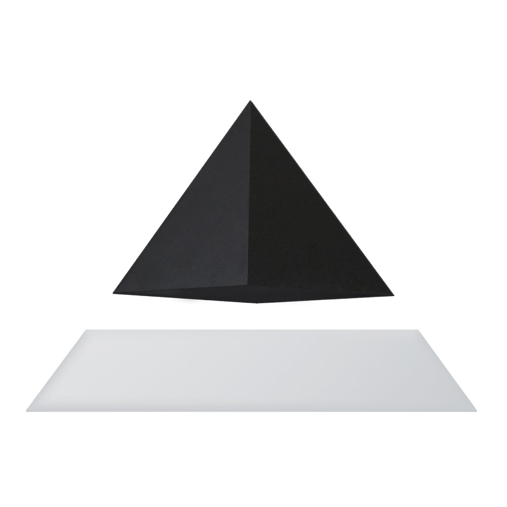 Levitating pyramid Py by Flyte, black top on a white base, product photo on a white background