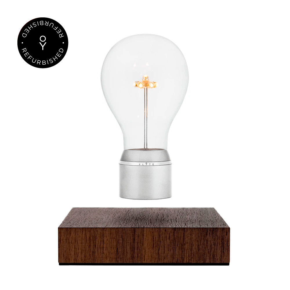 Levitating light bulb Light Edison by Flyte, product photo of chrome cap bulb and walnut magnetic base version with refurbished tag